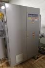 Used Skinetta Top Loading Case Erector Packer, Model CP 150. Servo driven loading head, with powered case feeder and case erector. Integrated top and bottom case taper. Includes controls. 3/60/480 Vo...