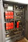 Used Skinetta Top Loading Case Erector Packer, Model CP 150. Servo driven loading head, with powered case feeder and case erector. Integrated top and bottom case taper. Includes controls. 3/60/480 Vo...