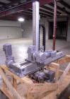 Used Skinetta CP150 Automatic Top Load Robotic Case Erector, Packer And Sealer. Has AB PLC controls, tape seal system and was last running bundles into top load case. Packer Erector / Sealer CP 150. ...