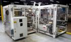 Used Focke Model 486 Automatic Case Erector, Side Load Packer, and Tape Sealer