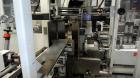 Used Focke Model 486 Automatic Case Erector, Side Load Packer, and Tape Sealer