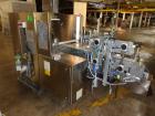 Used IMA Model CP15 Top Loading Case Packer. Capable of speeds up to 15 cases per minute. Case size range: (Length) 190mm-600mm, (Width) 80mm-400mm, (Height) 90mm-350mm. 3/60/480 Volt. Has Allen-Brad...