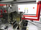 Used Marchesini Type PS 500 Automatic Case Erector / Packer / Sealer. Designed for cartons and equipped with multi-tier stacking collation, and RSC style cases with ps tape sealing. Capable of speeds...