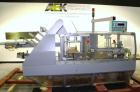Used Marchesini/Pack Service Automatic Case Erector/Packer/Tape Sealer, Model PS510. Rated up to 13 cases and 300 cartons per minute (depending on case size and pack pattern). Case Size Range: 5.6