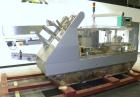 Used Marchesini/Pack Service Automatic Case Erector/Packer/Tape Sealer, Model PS510. Rated up to 13 cases and 300 cartons per minute (depending on case size and pack pattern). Case Size Range: 5.6