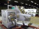Used Marchesini/Pack Service Automatic Case Erector/Packer/Tape Sealer, Model PS510. Rated up to 13 cases and 300 cartons per minute (depending on case size and pack pattern). Case Size Range: 5.6