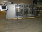 Used Rockford Midland Case Packer, Model  808TS. Last running at speeds of 200 cpm. Has down stacker, AB SLC 5/03 PLC controller. Max case size: 15