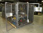 Used Rockford Midland Case Packer, Model  808TS. Last running at speeds of 200 cpm. Has down stacker, AB SLC 5/03 PLC controller. Max case size: 15