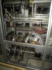 Used Rockford Midland Case Packer, Model  808TS. Last running at speeds of 200 cpm. Has down stacker, AB SLC 5/03 PLC controller. Max case size: 15