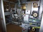 Used Cermex Sidel model SD59 top loading case packer capable of speeds up to 28 case per minute. Has automatic collation, AB PLC controls, tape seal system.