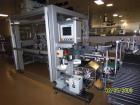 Used Cermex Sidel model SD59 top loading case packer capable of speeds up to 28 case per minute. Has automatic collation, AB PLC controls, tape seal system.