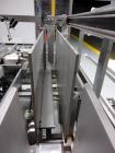 Used- Christ Packaging (Skinetta) Case Packer ,  Model CP145