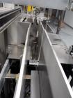 Used- Christ Packaging (Skinetta) Case Packer ,  Model CP145