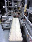 Used- Christ Packaging (Skinetta) Case Packer ,  Model CP145