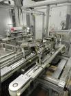 Used- Skinetta Model Pick & Place 2000 Robotic Case Packing System