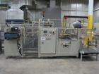 Used Smurfit-Stone Packomatic Model 1588 Case Former and Packer. New 2002. Up to 25 cases per hour, maximum case size 24