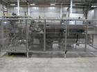 Used Smurfit-Stone Packomatic Model 1588 Case Former and Packer. New 2002. Up to 25 cases per hour, maximum case size 24