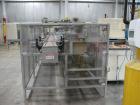Used Smurfit-Stone Packomatic Model 1588 Case Former and Packer. New 2002. Up to 25 cases per hour, maximum case size 24