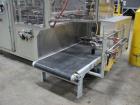 Used Smurfit-Stone Packomatic Model 1588 Case Former and Packer. New 2002. Up to 25 cases per hour, maximum case size 24