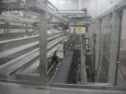 Used Smurfit-Stone Packomatic Model 1588 Case Former and Packer. New 2002. Up to 25 cases per hour, maximum case size 24