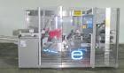 Used Uhlmann Model E4040 Case Packer.