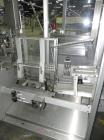 Used Uhlmann Model E4040 Case Packer.