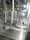 Used- Uhlmann Model E4040 Case Packer.