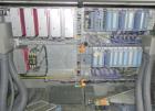 Used Uhlmann Model E4040 Case Packer.