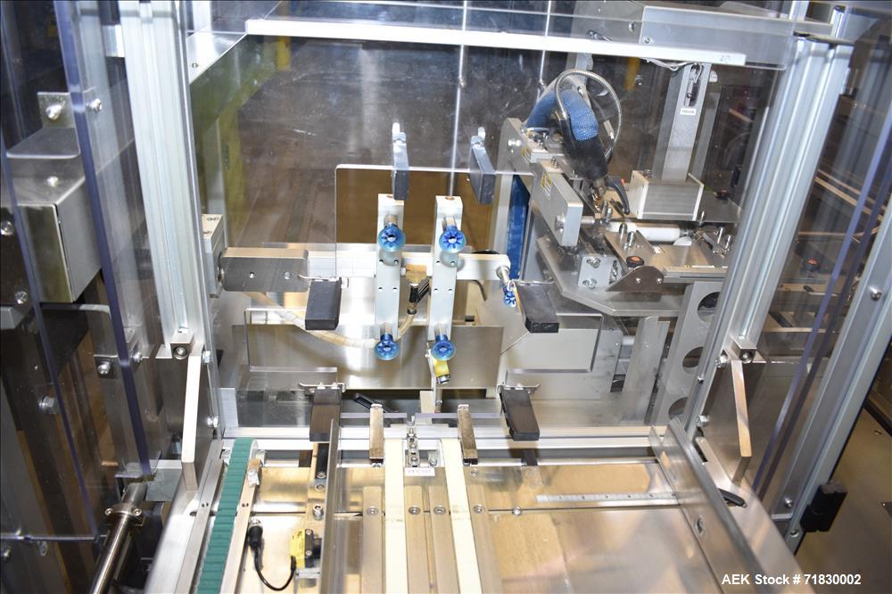 Used MGS Model TLC Top Load Cartoner with Robotic Pick and Place Unit.