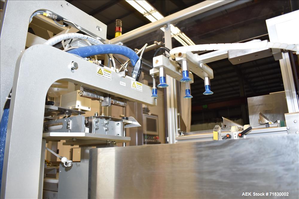 Used MGS Model TLC Top Load Cartoner with Robotic Pick and Place Unit.
