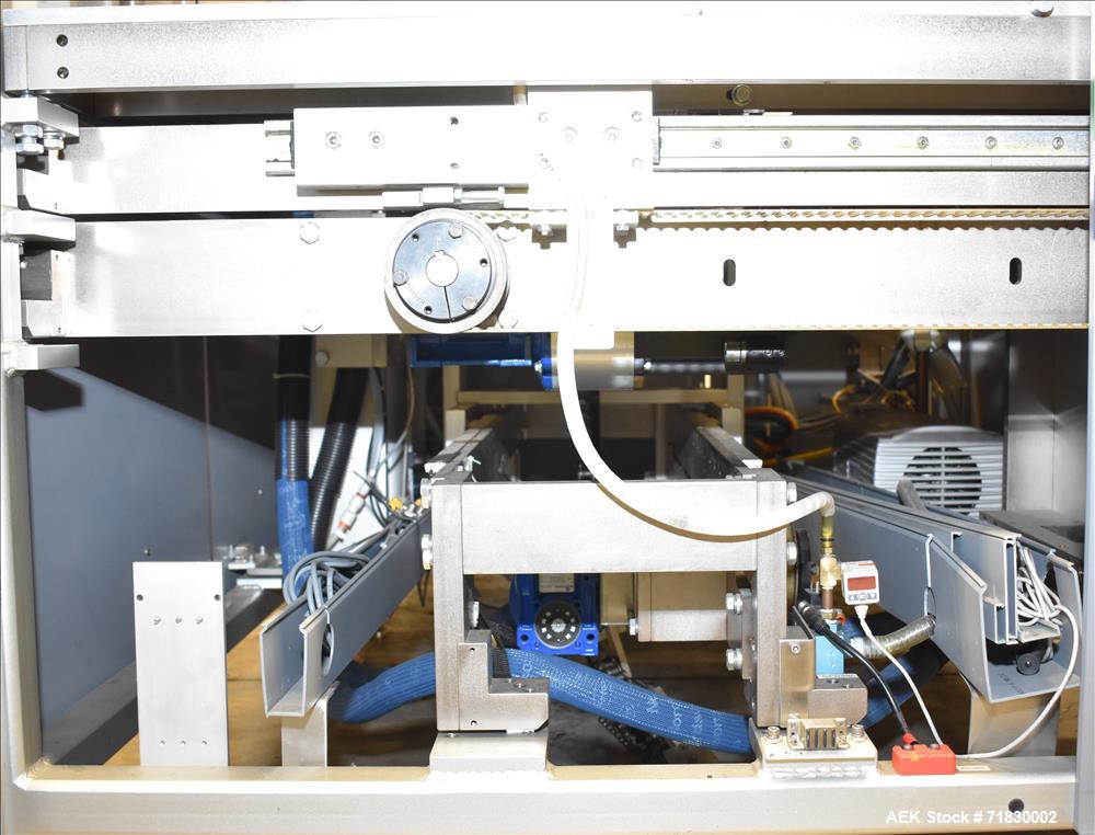 Used MGS Model TLC Top Load Cartoner with Robotic Pick and Place Unit.