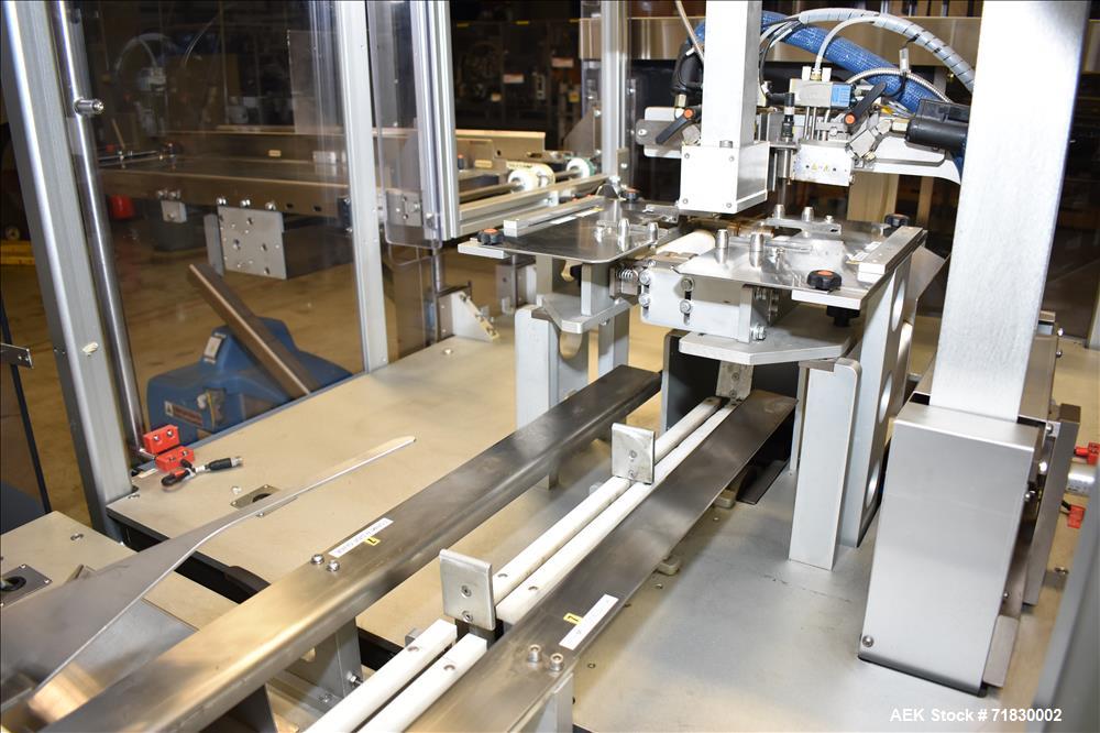Used MGS Model TLC Top Load Cartoner with Robotic Pick and Place Unit.