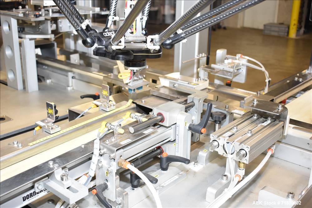 Used MGS Model TLC Top Load Cartoner with Robotic Pick and Place Unit.