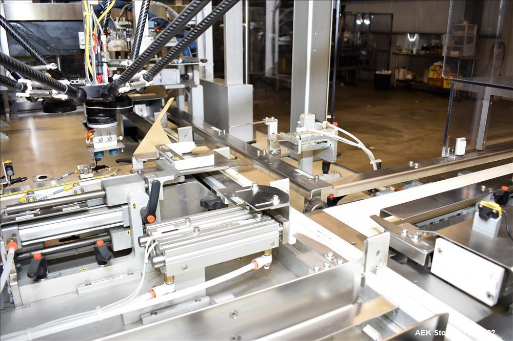 Used MGS Model TLC Top Load Cartoner with Robotic Pick and Place Unit.