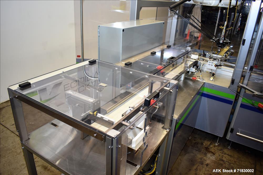 Used MGS Model TLC Top Load Cartoner with Robotic Pick and Place Unit.
