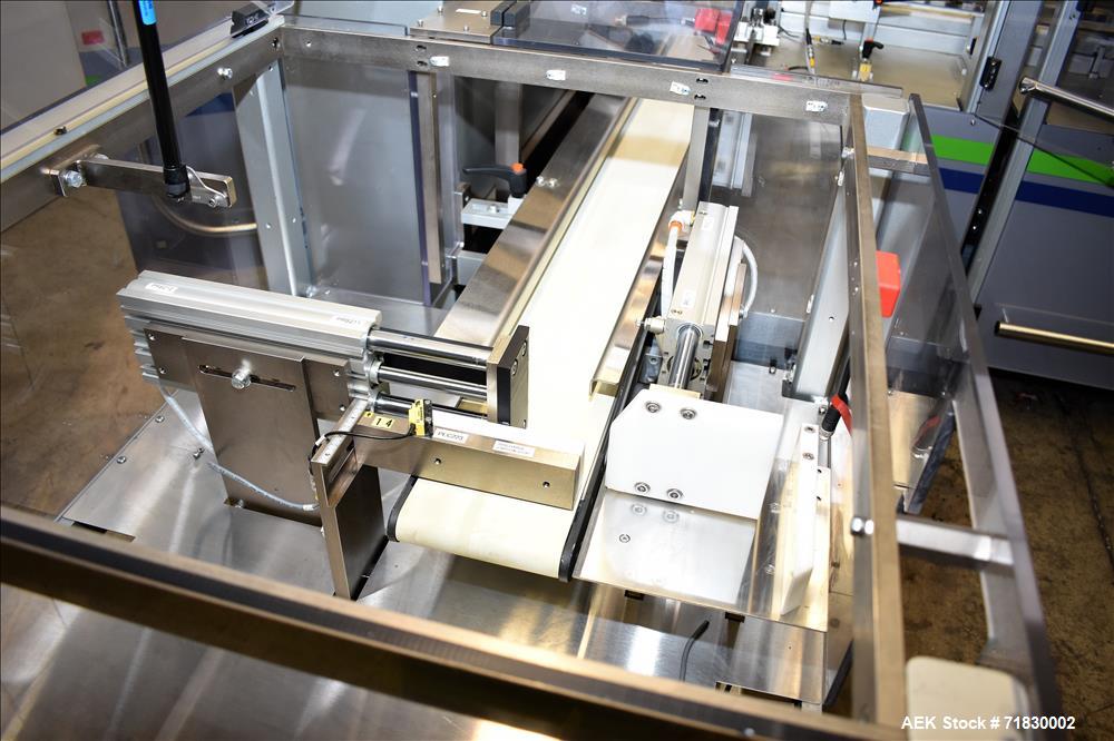 Used MGS Model TLC Top Load Cartoner with Robotic Pick and Place Unit.