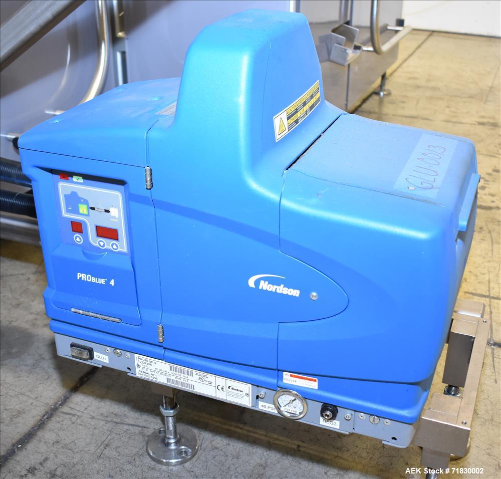 Used MGS Model TLC Top Load Cartoner with Robotic Pick and Place Unit.