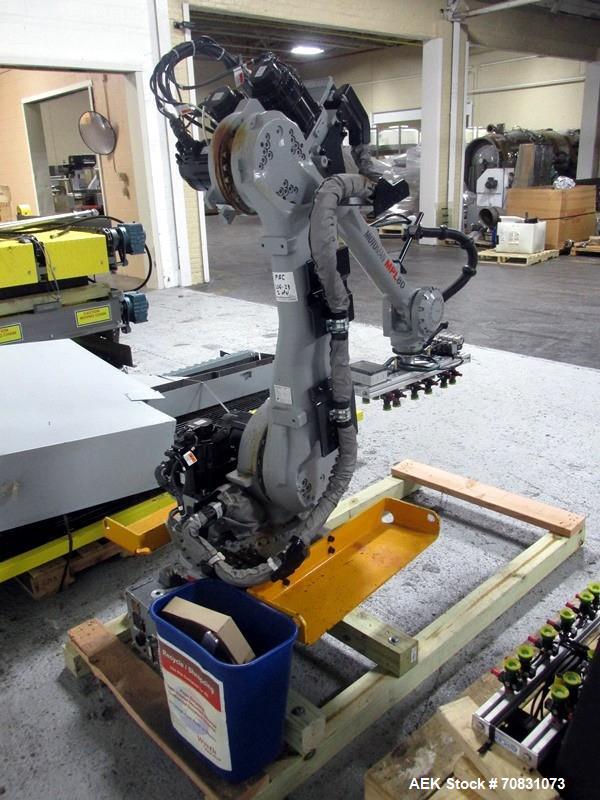 Used Motoman Robot Packaging Robotic Case Packaging System. Consisting of Motoman robotic arm, model MPL80, 5-point articulation with 80 kg max capacity serial# S06A62-1-2, with pallet conveyors and ...