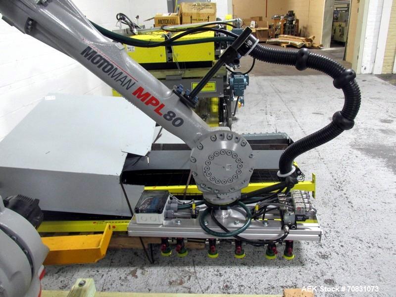 Used Motoman Robot Packaging Robotic Case Packaging System. Consisting of Motoman robotic arm, model MPL80, 5-point articulation with 80 kg max capacity serial# S06A62-1-2, with pallet conveyors and ...