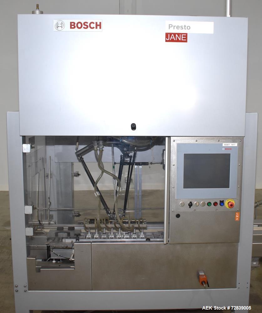 Used Bosch (Syntegon) Presto Robotic Top Load Robotic Carton loader. Capable of speeds up to 400 packages per minute. Has a product size range: Length 2" to 7.9" or 50mm to 200mm, width .6" to 4.7" o...