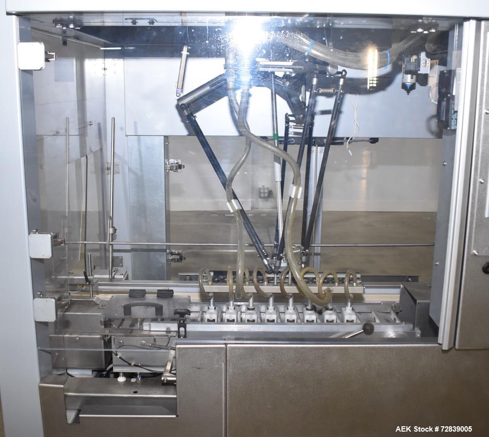 Used Bosch (Syntegon) Presto Robotic Top Load Robotic Carton loader. Capable of speeds up to 400 packages per minute. Has a product size range: Length 2" to 7.9" or 50mm to 200mm, width .6" to 4.7" o...