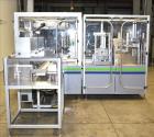 Used MGS Model TLC Top Load Cartoner with Robotic Pick and Place Unit.