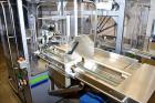 Used MGS Model TLC Top Load Cartoner with Robotic Pick and Place Unit.
