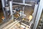 Used MGS Model TLC Top Load Cartoner with Robotic Pick and Place Unit.