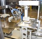 Used MGS Model TLC Top Load Cartoner with Robotic Pick and Place Unit.