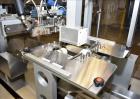 Used MGS Model TLC Top Load Cartoner with Robotic Pick and Place Unit.