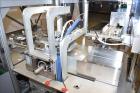 Used- MGS Model TLC Top Load Cartoner with Robotic Pick and Place Unit.