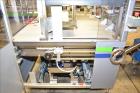 Used MGS Model TLC Top Load Cartoner with Robotic Pick and Place Unit.
