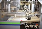 Used MGS Model TLC Top Load Cartoner with Robotic Pick and Place Unit.
