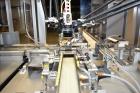 Used MGS Model TLC Top Load Cartoner with Robotic Pick and Place Unit.